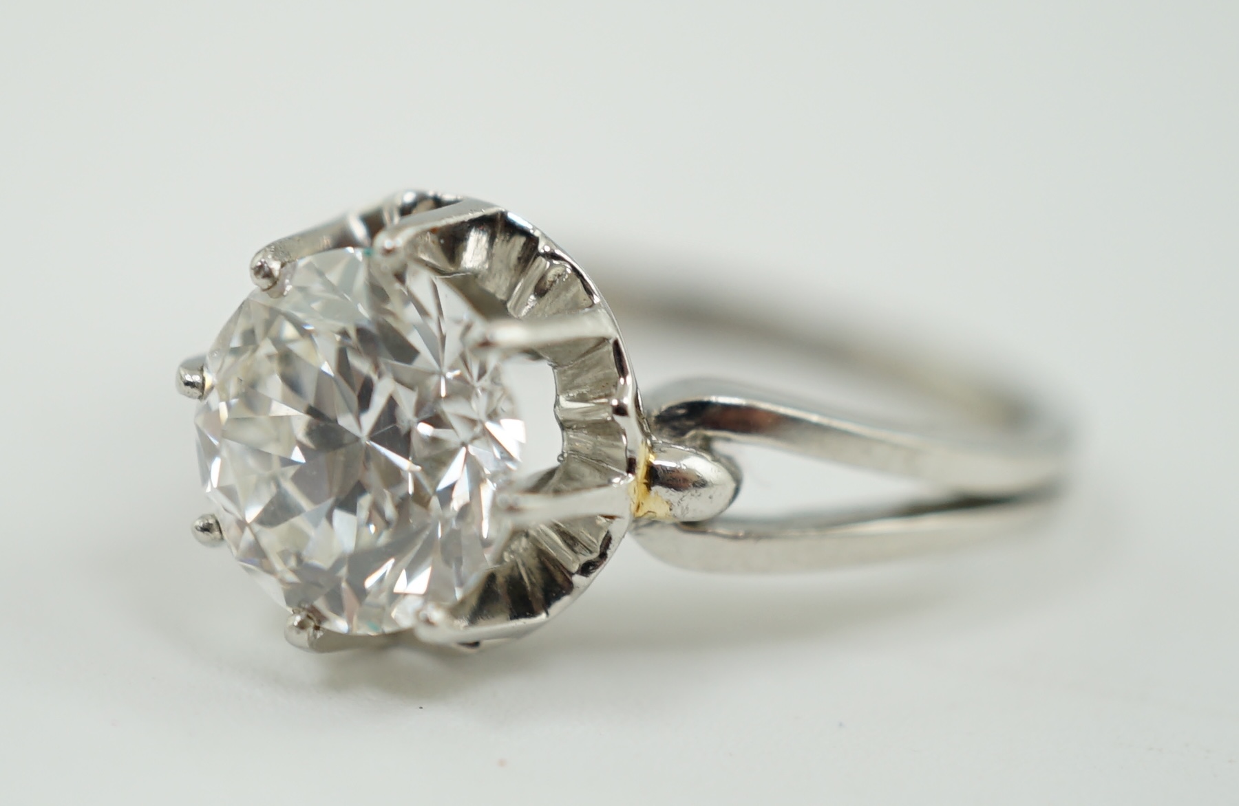 A platinum and solitaire diamond set ring